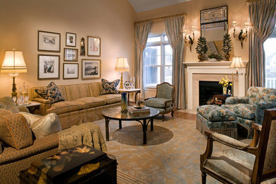 Example of a large classic formal and open concept light wood floor and beige floor living room design in New York with beige walls, a standard fireplace, a tile fireplace and no tv