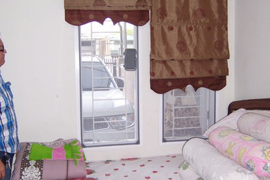 Bedroom - modern bedroom idea in Other
