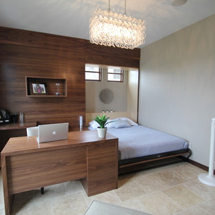 Photo of a contemporary guest bedroom in Cedar Rapids with travertine floors.