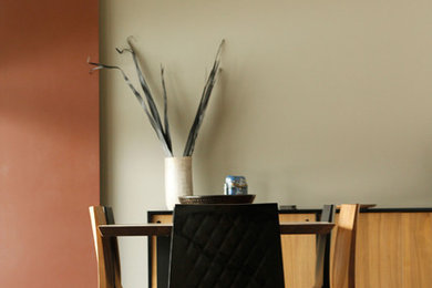 Example of a mid-sized eclectic dark wood floor great room design in Other with gray walls