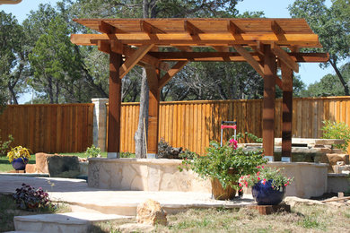 Design ideas for a traditional full sun backyard formal garden in Orange County.