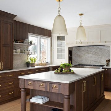 Luxury Transitional Kitchen with Walnut Cabinetry, Marble Slab Backsplash & Bras