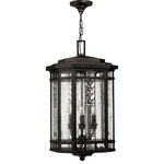 Hinkley Lighting - Tahoe 4 Light Outdoor Pendant or Chandeller, Regency Bronze - Tahoe makes a classic Arts & Crafts design statement in cast aluminum construction with panels of clear seedy water glass and copper foil art glass accents.