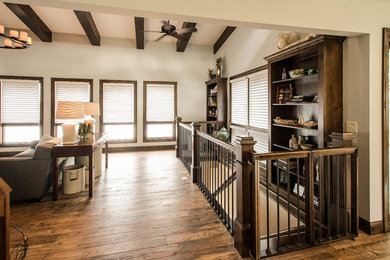 Example of a mid-sized mountain style carpeted straight staircase design in Minneapolis with carpeted risers
