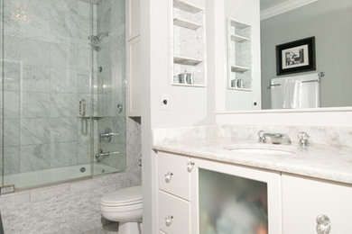 Inspiration for a mid-sized transitional master white tile and marble tile marble floor and white floor tub/shower combo remodel in Grand Rapids with white cabinets, gray walls, an undermount sink, quartzite countertops, a hinged shower door and white countertops