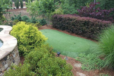 Inspiration for a mid-sized full sun backyard garden path in Charlotte.
