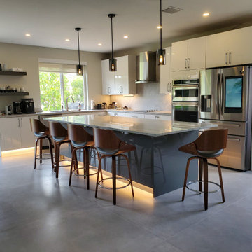 Stunning Kitchen Remodel Done in White and Gray Cabinets