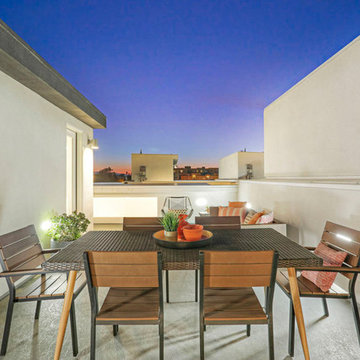 Orange and Brown Palette for Rooftop Deck with City Views