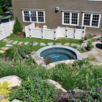 Custom Spa with Slope Landscape