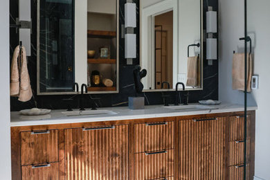 Bathroom - large contemporary master black tile and porcelain tile porcelain tile, beige floor and double-sink bathroom idea in Other with medium tone wood cabinets, a two-piece toilet, beige walls, an undermount sink, quartz countertops, a hinged shower door, white countertops and a built-in vanity