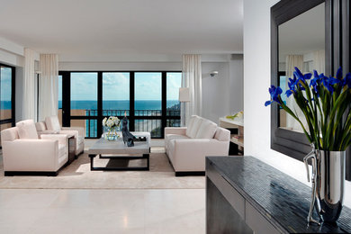 Large trendy open concept porcelain tile and white floor living room photo in Miami with white walls, no fireplace and a wall-mounted tv