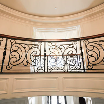Project #74 | Circular Staircase with Hand-Forged Metal Panels