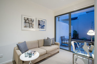 This is an example of a contemporary living room in Brisbane.