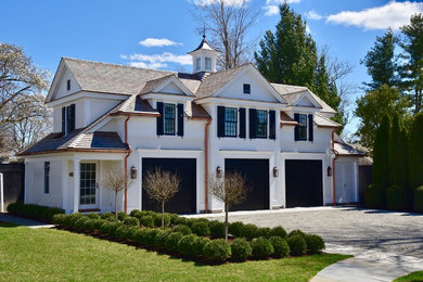 Inspiration for a timeless white two-story wood exterior home remodel in New York with a shingle roof