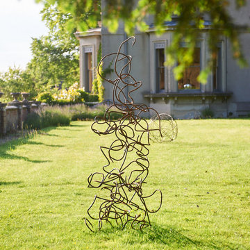 Large twisted steel sculpture- rusted