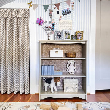 Charming Girls Bedroom Interior With Light Blue Classic Stripes Wallpaper