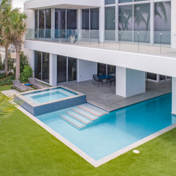 Custom Swimming Pool & Spa That Goes Underneath Part of the The House