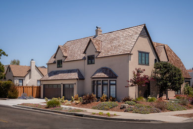 Elegant brown two-story stucco exterior home photo in San Francisco