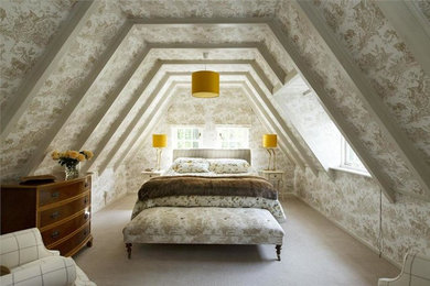 Photo of a large country master bedroom in Amsterdam with beige walls and carpet.