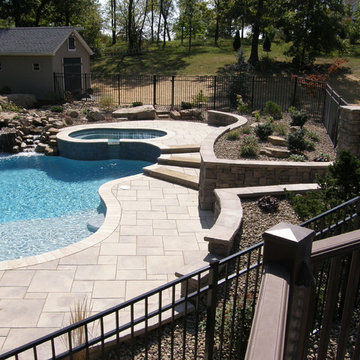 Pool oasis with stream and waterfall