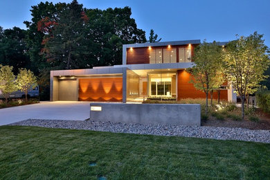 Mid-sized trendy brown two-story wood exterior home photo in Toronto