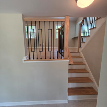 Modern Wood and Metal Railing with Black Window Balusters