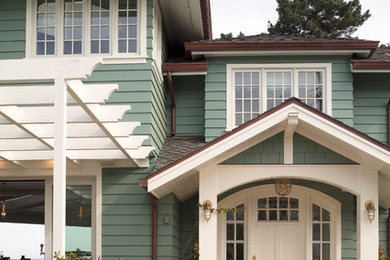 Large beach style light wood floor and beige floor single front door photo in San Francisco with blue walls and a white front door