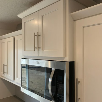 Milan, IL New Construction MSI Quartz Koch Express Cabinets White and Java