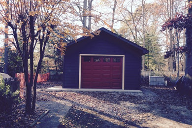 Garage workshop - mid-sized traditional detached one-car garage workshop idea in Richmond