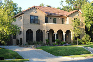 Tuscan exterior home photo in Dallas