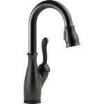 Delta - Delta Leland Pull-Down Bar/Prep Faucet With Touch2O Technology, Venetian Bronze - Touch it on. Touch it off. Whether you have two full hands or 10 messy fingers, Delta Touch2O Technology helps keep your faucet clean, even when your hands aren�t. A simple touch anywhere on the spout or handle with your wrist or forearm activates the flow of water at the temperature where your handle is set. The Delta TempSense LED light changes color to alert you to the water�s temperature and eliminate any possible surprises or discomfort. Delta MagnaTite Docking uses a powerful integrated magnet to pull your faucet spray wand precisely into place and hold it there so it stays docked when not in use. Delta faucets with DIAMOND Seal Technology perform like new for life with a patented design which reduces leak points, is less hassle to install and lasts twice as long as the industry standard*. Kitchen faucets with Touch-Clean  Spray Holes  allow you to easily wipe away calcium and lime build-up with the touch of a finger. You can install with confidence, knowing that Delta faucets are backed by our Lifetime Limited Warranty. Electronic parts are backed by our 5-year electronic parts warranty.  *Industry standard is based on ASME A112.18.1 of 500,000 cycles.