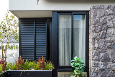 Example of an exterior home design in Other
