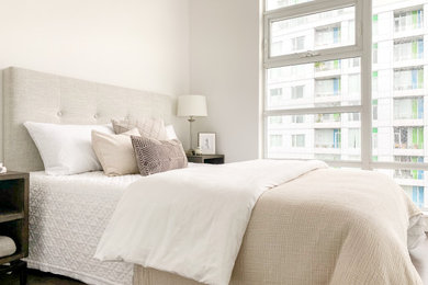 This is an example of a contemporary bedroom in Vancouver.