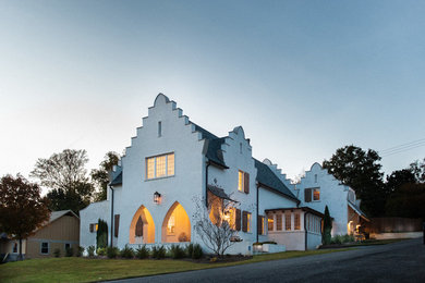 Example of a tuscan exterior home design in Birmingham