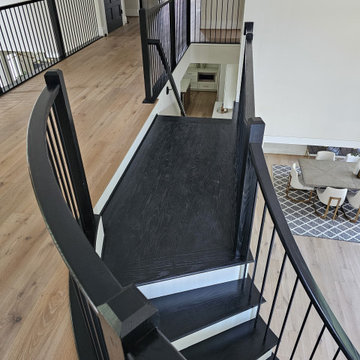 Project #130 | Curved Staircase with Wraparound Balcony