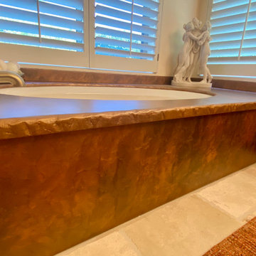 Yellow Onyx Epoxy Countertops with Hammered Copper Tub Surround