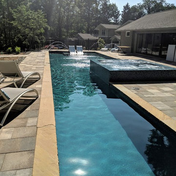 Gorgeous Glass Tile 360 Spillover Spa and lap pool