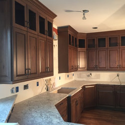Colorful nature stone herringbone pattern backsplash before picture - Products