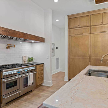 Luxurious Modern Farmhouse Kitchen: Oversized Marble Island, Pro Appliances, and