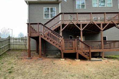 Example of an arts and crafts deck design in Atlanta