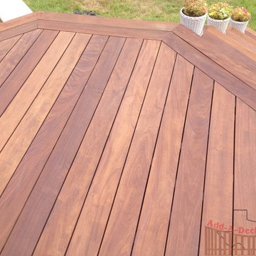 Ipe Hardwood Decking with Metal Framing, Limestone Flower Beds around Deck