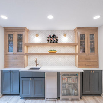 Warm & Inviting Basement Retreat with Custom Bar + Entertainment Center