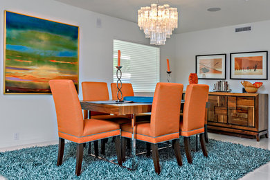 Mid-sized trendy ceramic tile and white floor great room photo in Orange County with white walls and no fireplace