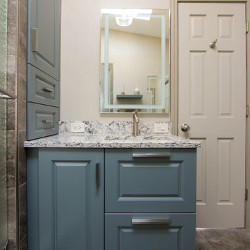 Small Masterbath with Green Cabinetry, Custom Tiled Shower and Storage