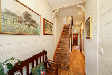 Small traditional wood straight staircase in Newcastle - Maitland with wood risers.