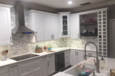 Example of a transitional kitchen design in Orlando
