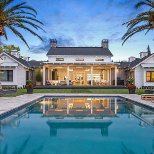 サンフランシスコの中サイズの長方形カントリー風おしゃれなプール (天然石敷き) の写真