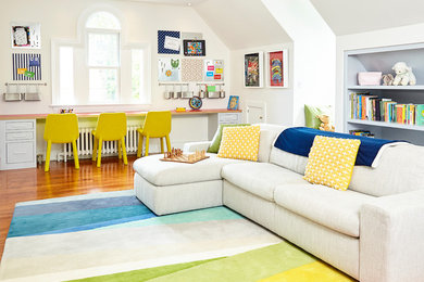 Inspiration for a large transitional gender-neutral kids' playroom for kids 4-10 years old in Wilmington with white walls, medium hardwood floors and brown floor.