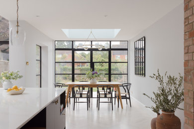 Contemporary dining room in West Midlands.
