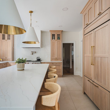 Scandinavian Kitchen with Light Oak Cabinets and Quartzite Island